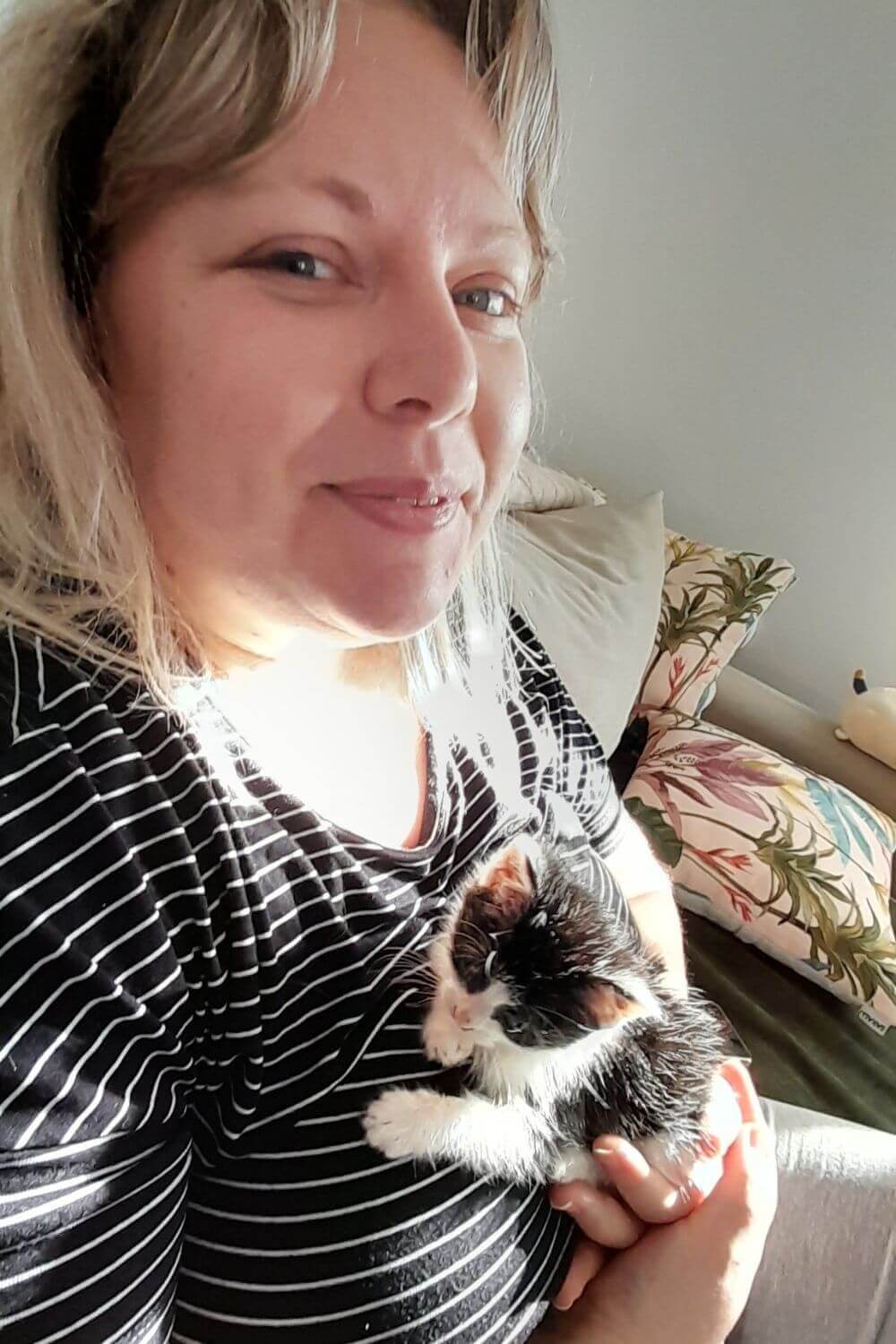 Kiki Curled up and Loved by Mommy